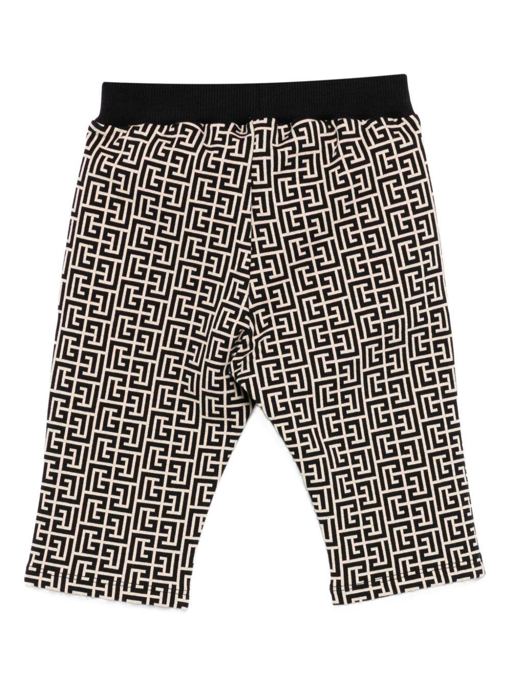 Pantaloni per neonato Balmain Kids beige con motivo monogramma - Rubino Kids