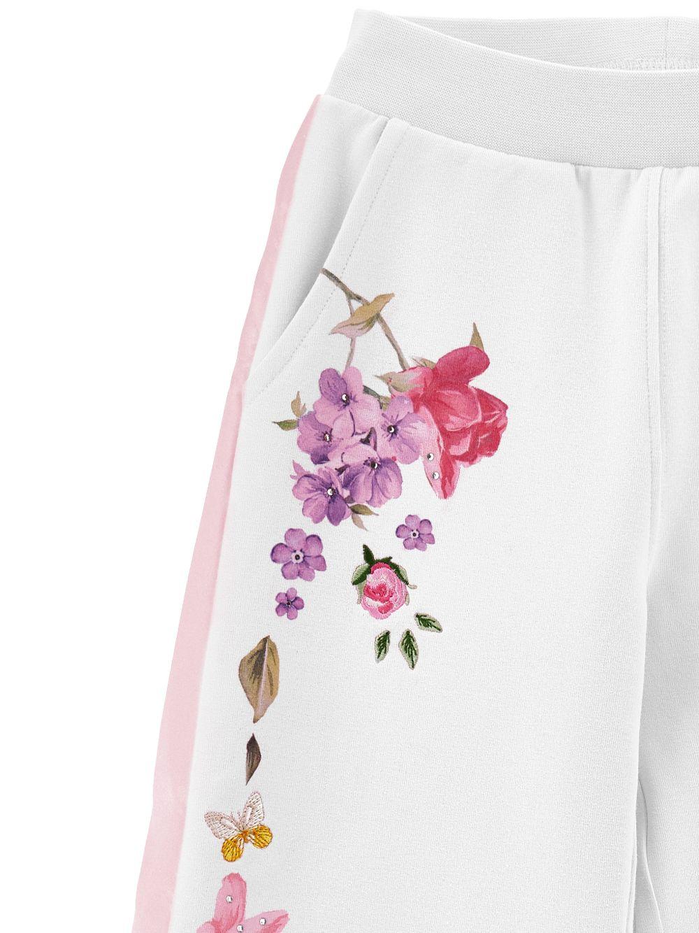 Pantaloni sportivi per bambina Monnalisa bianchi a fiori - Rubino Kids
