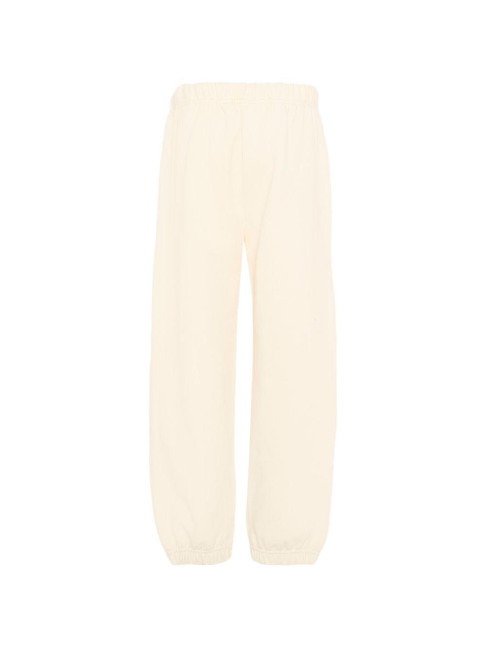 Pantaloni sportivi per bambino Palm Angels Kids beige con logo laterale - Rubino Kids