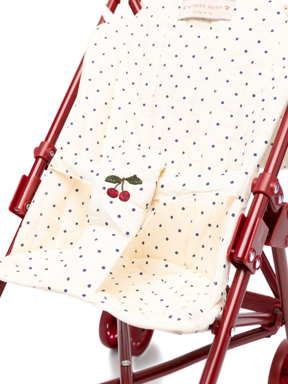 Passeggino giocattolo per bambina Konges Sløjd rosso con dettagli a pois - Rubino Kids