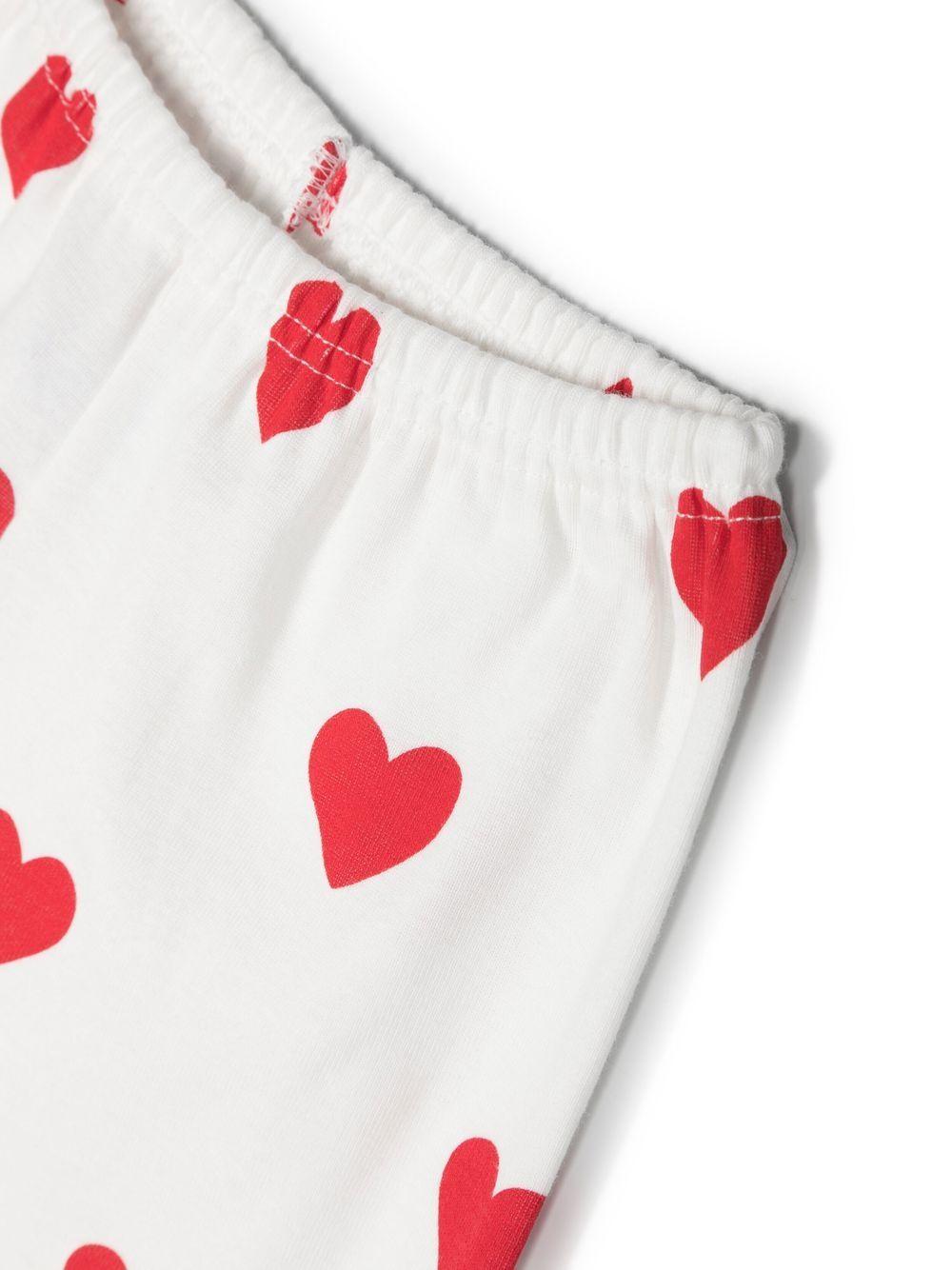 Pigiama per bambina Petit Bateau bianco con motivo a cuori - Rubino Kids