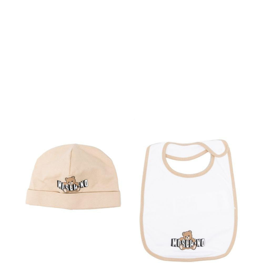 Set capellino e bavaglino per neonati Moschino Kids beige e bianco con stampa Teddy Bear - Rubino Kids