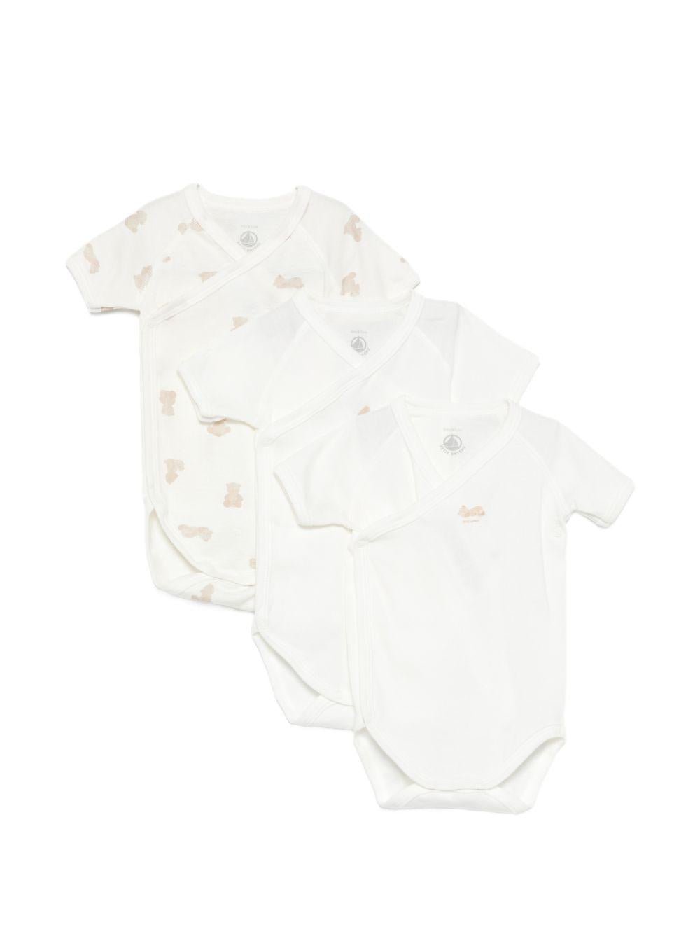 Set di tre tutine per neonati Petit Bateau bianchi con fantasie diverse - Rubino Kids