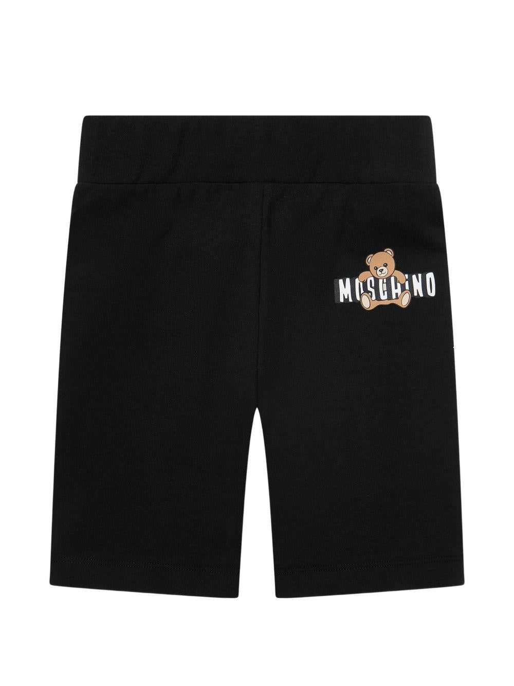 Set t-shirt e shorts per bambina Moschino Kids bianco e nero con motivo Teddy Bear - Rubino Kids