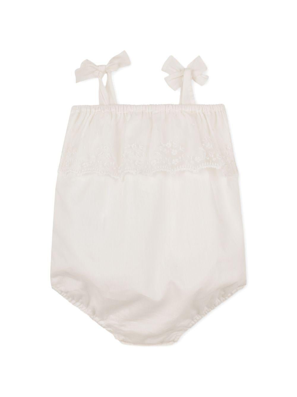 Set tutina e capellino per neonata Chloé Kids bianco con finiture in pizzo - Rubino Kids