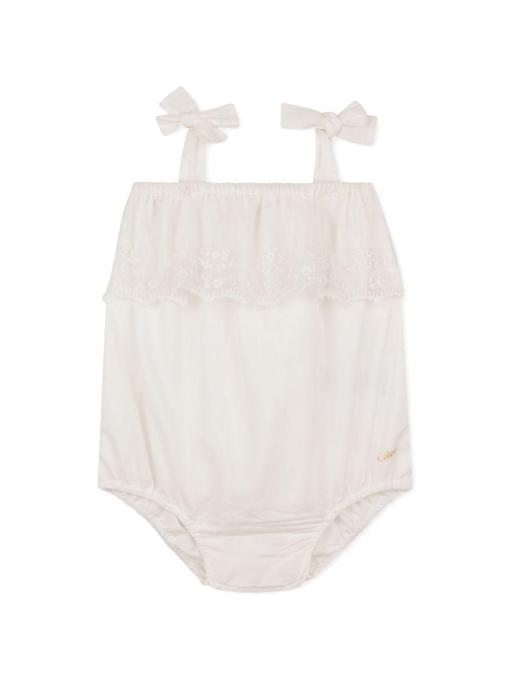 Set tutina e capellino per neonata Chloé Kids bianco con finiture in pizzo - Rubino Kids