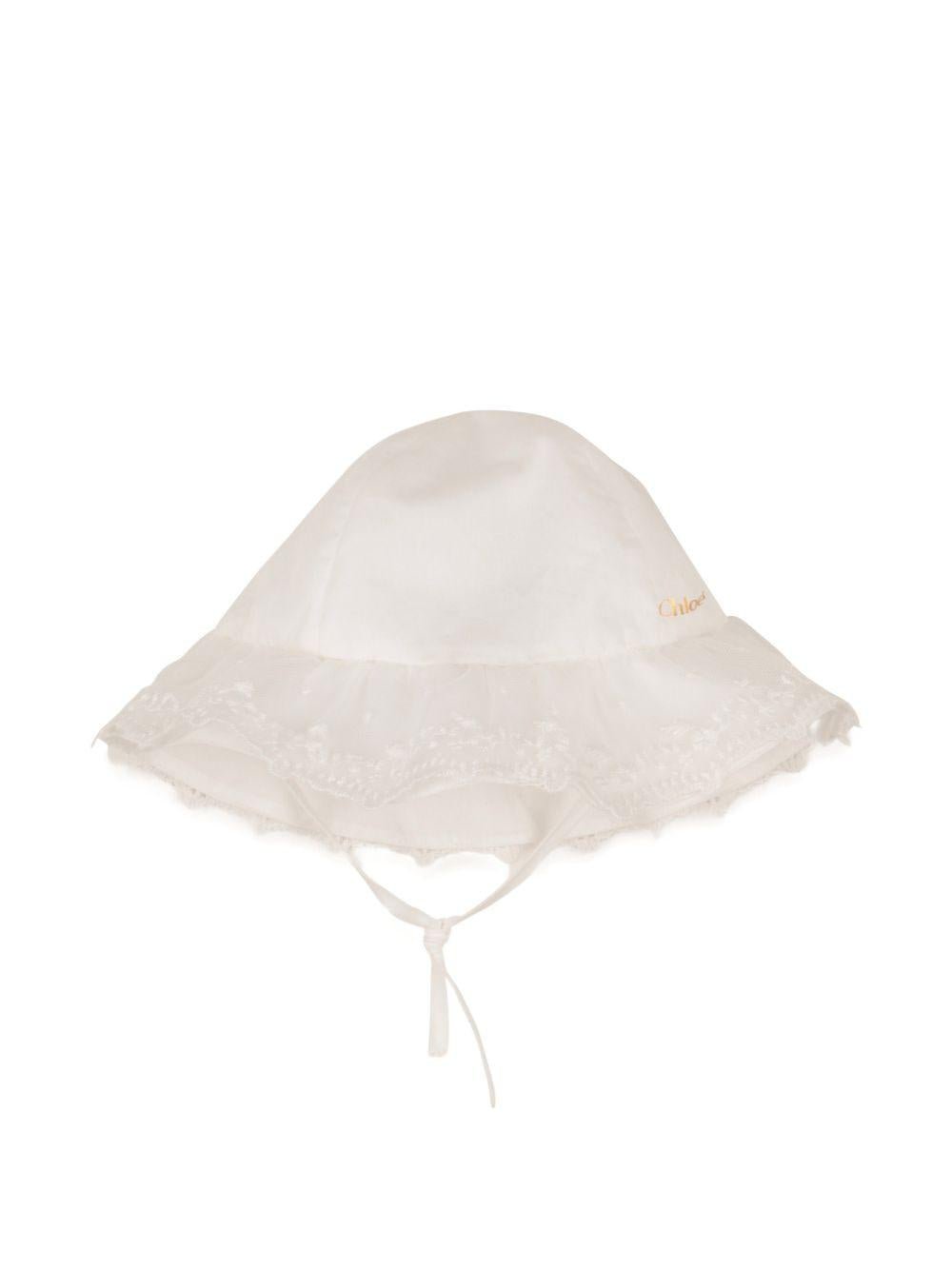 Set tutina e capellino per neonata Chloé Kids bianco con finiture in pizzo - Rubino Kids