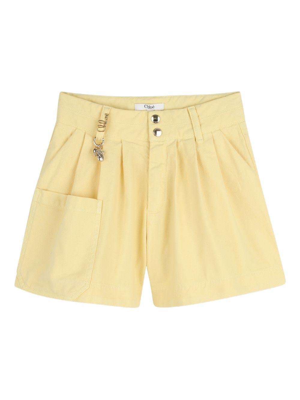 Shorts per bambina Chloé Kids giallo con dettaglio ciondolo - Rubino Kids