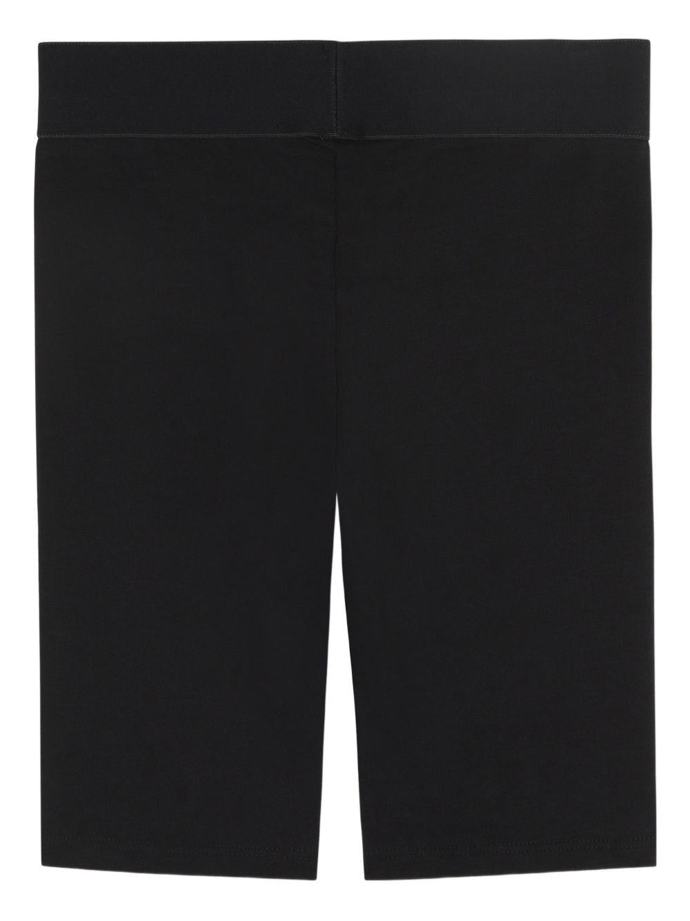 Shorts per bambina Dkny Kids nero con stampa logo - Rubino Kids