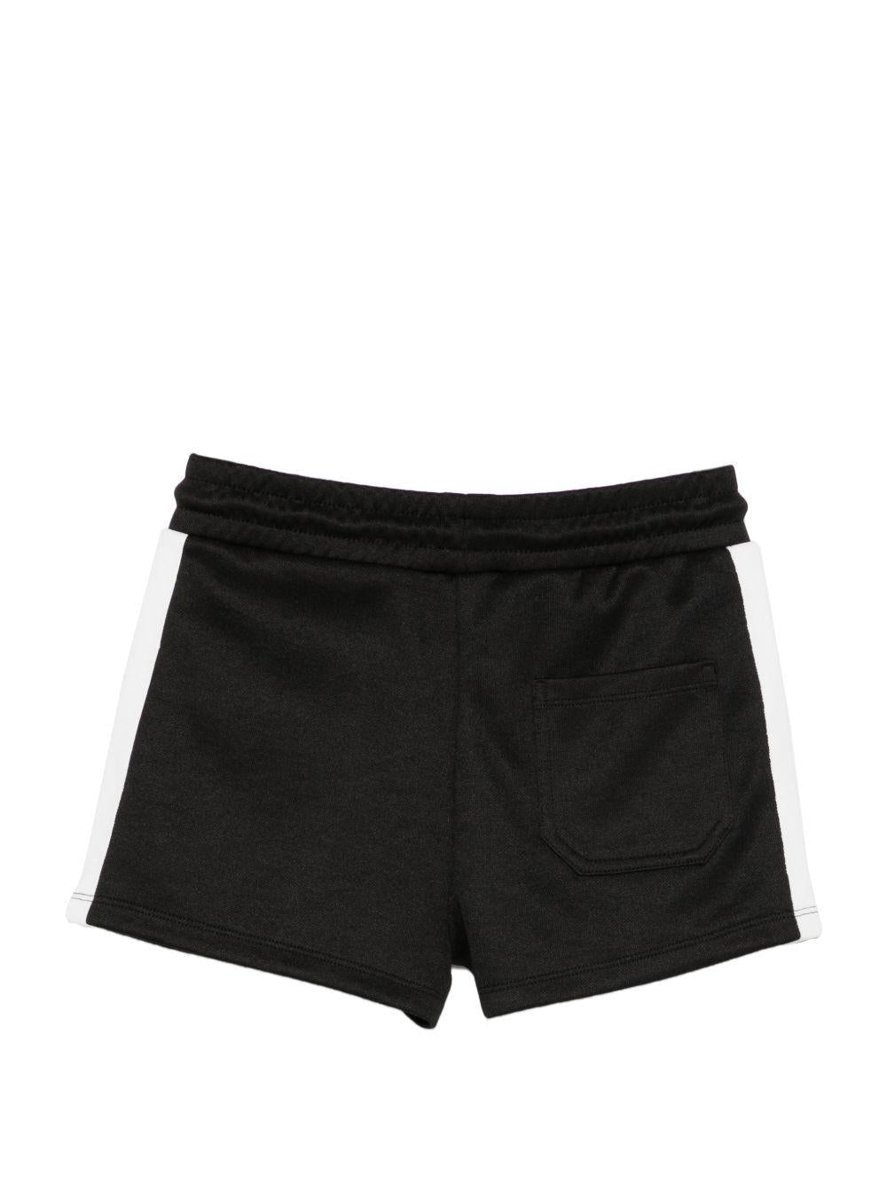 Shorts per bambina Stella McCartney Kids neri con logo sul davanti - Rubino Kids