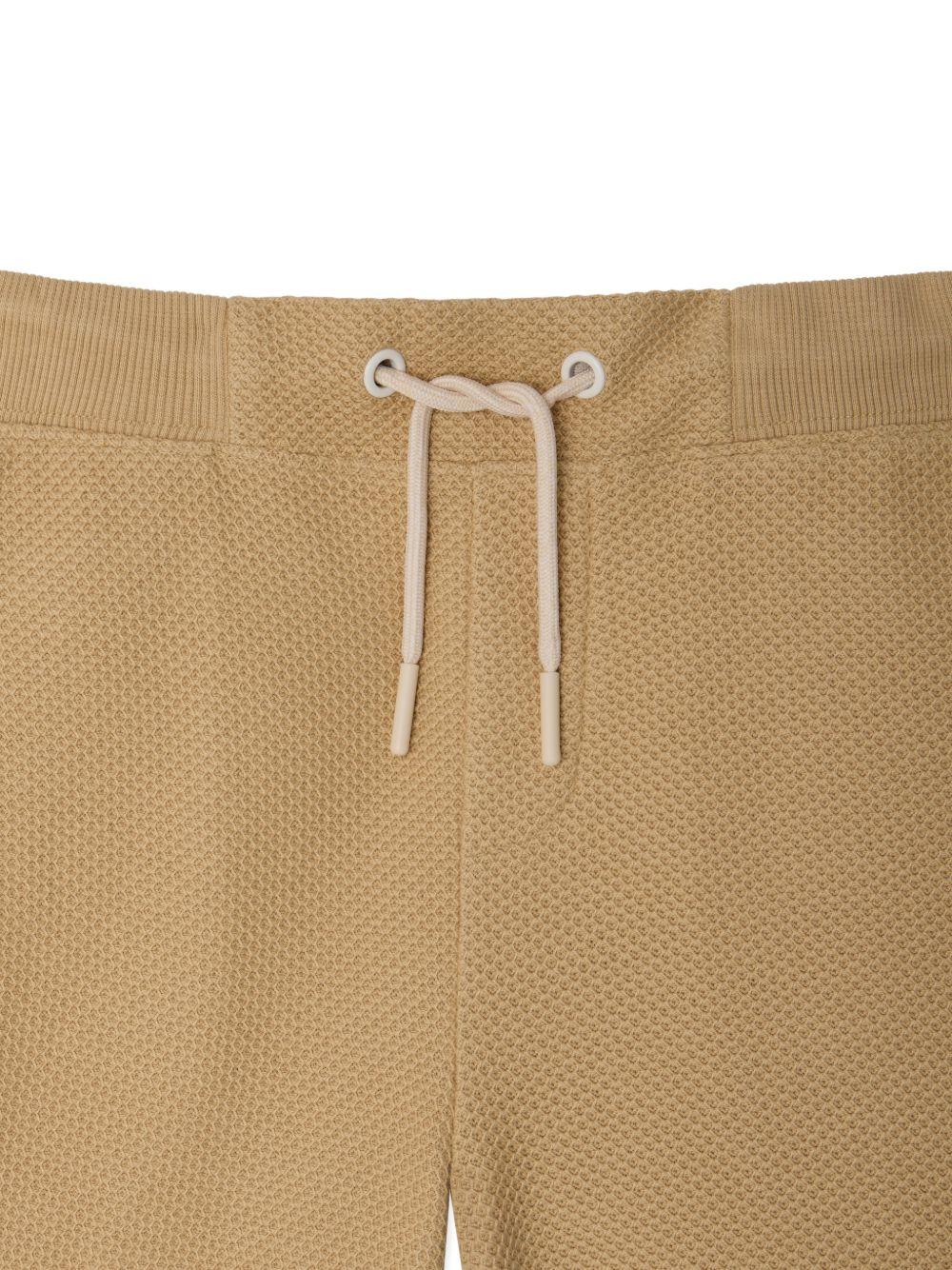 Shorts per bambino Bonpoint beige con ricamo logo sul retro - Rubino Kids