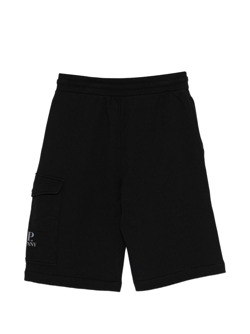 Shorts per bambino C.P. Company Kids neri con logo sulla tasca - Rubino Kids