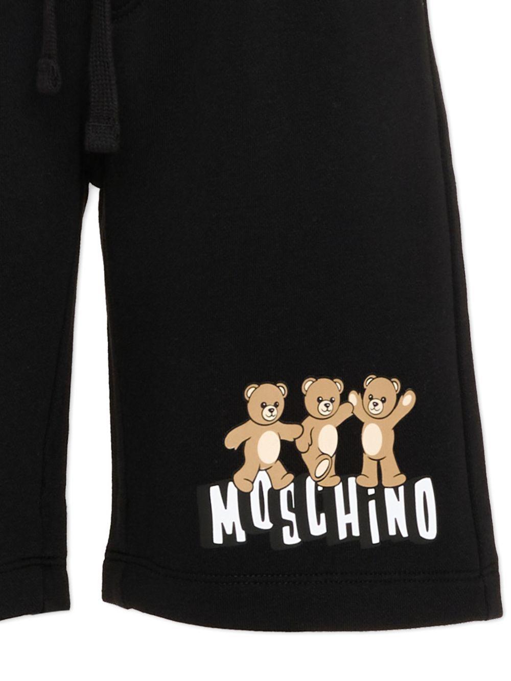 Shorts per bambino Moschino Kids nero con stampa tre Teddy Bear - Rubino Kids