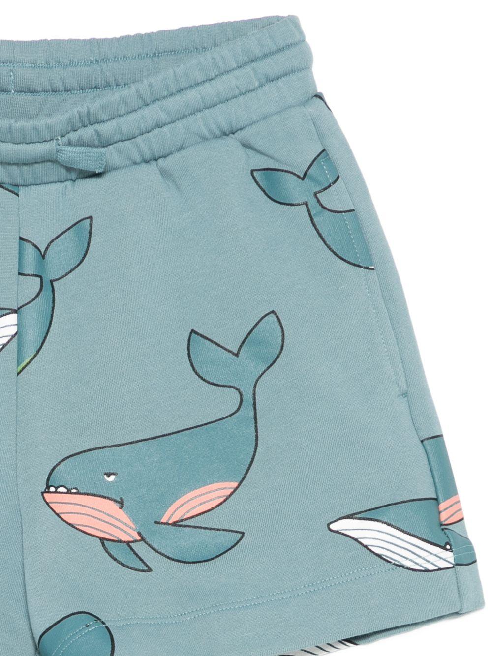 Shorts per bambino Stella McCartney Kids blu con stampa balene all - over - Rubino Kids