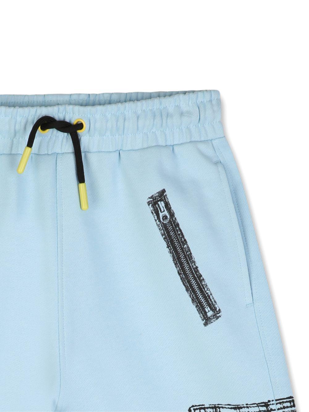 Shorts per bambino The Marc Jacobs azzurro con stampa grafica - Rubino Kids