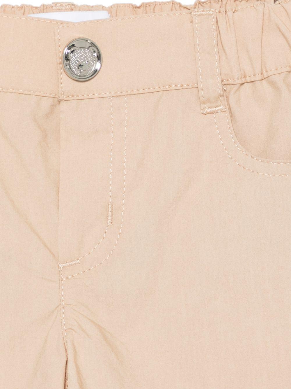 Shorts per neonato Moschino Kids beige con logo sul retro - Rubino Kids
