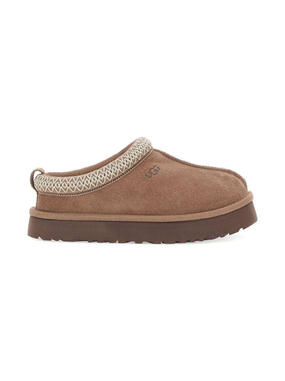 Slippers Tazz per bambini UGG Kids beige con rifiniture intrecciate - Rubino Kids