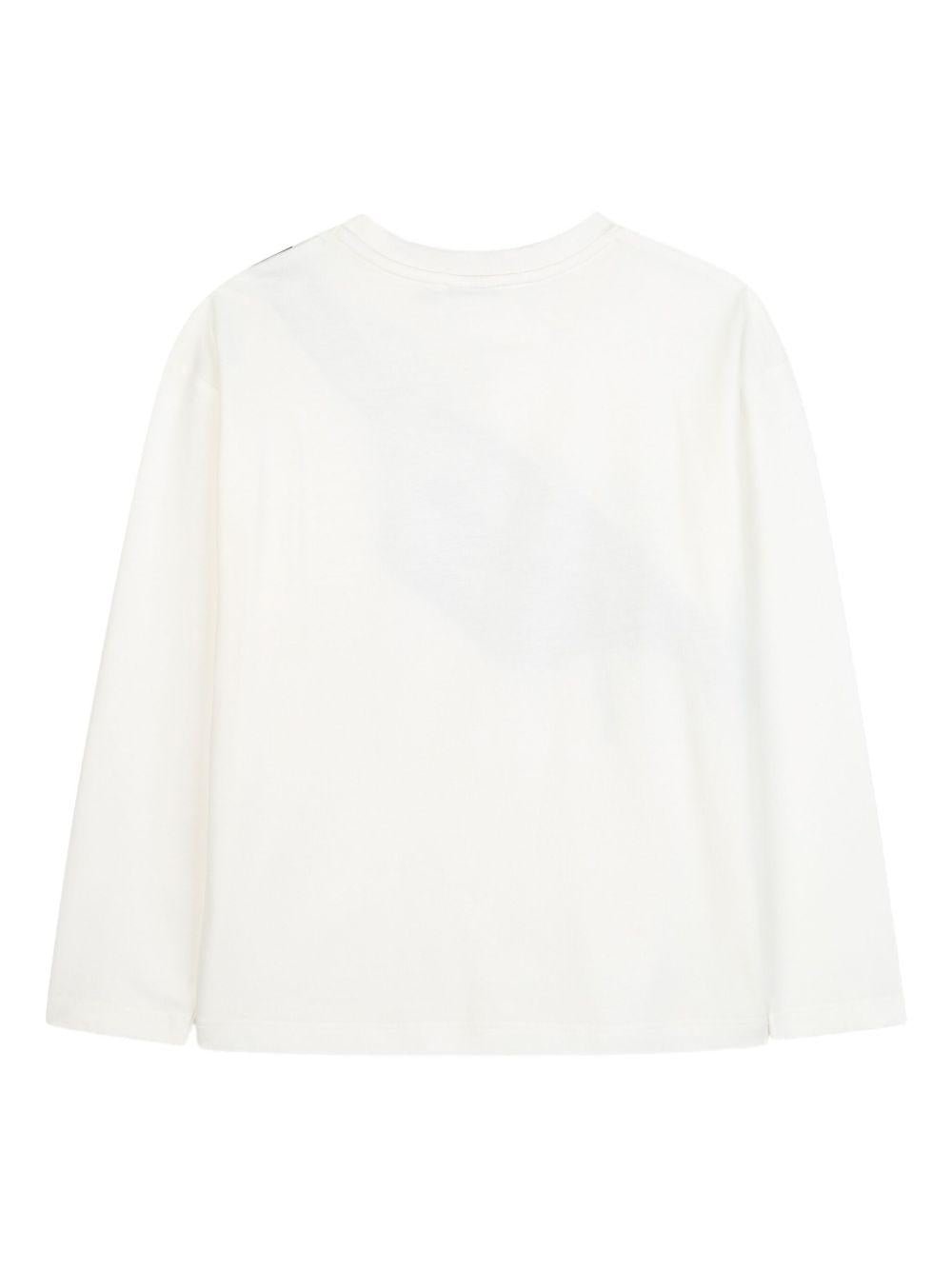 T-shirt per bambino The Marc Jacobs Kids bianco a maniche lunghe con stampa trompe l'oeil - Rubino Kids