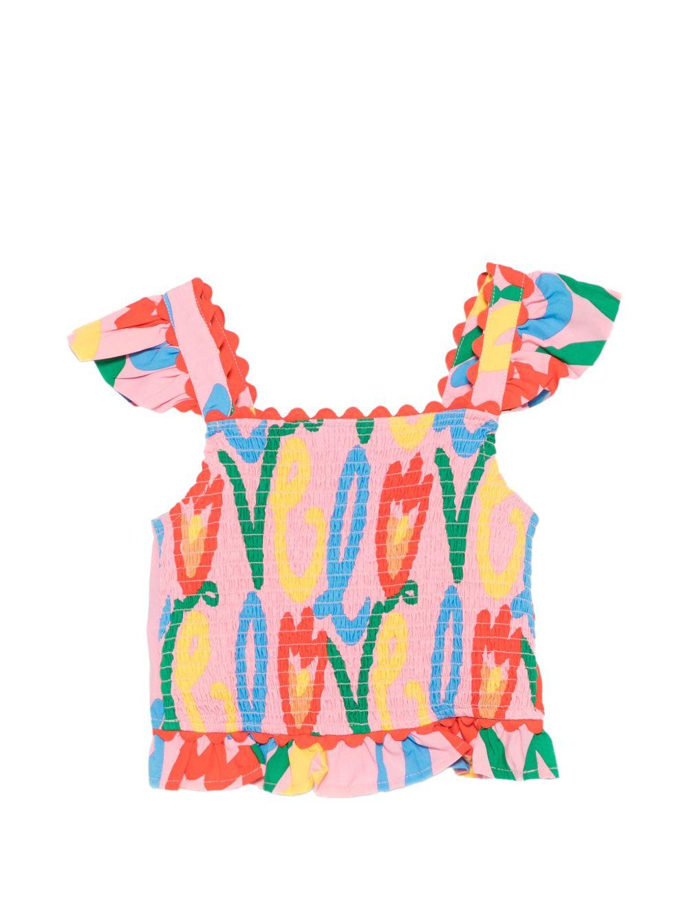 Top per bambina Stella McCartney Kids rosa con stampa grafica all - over - Rubino Kids