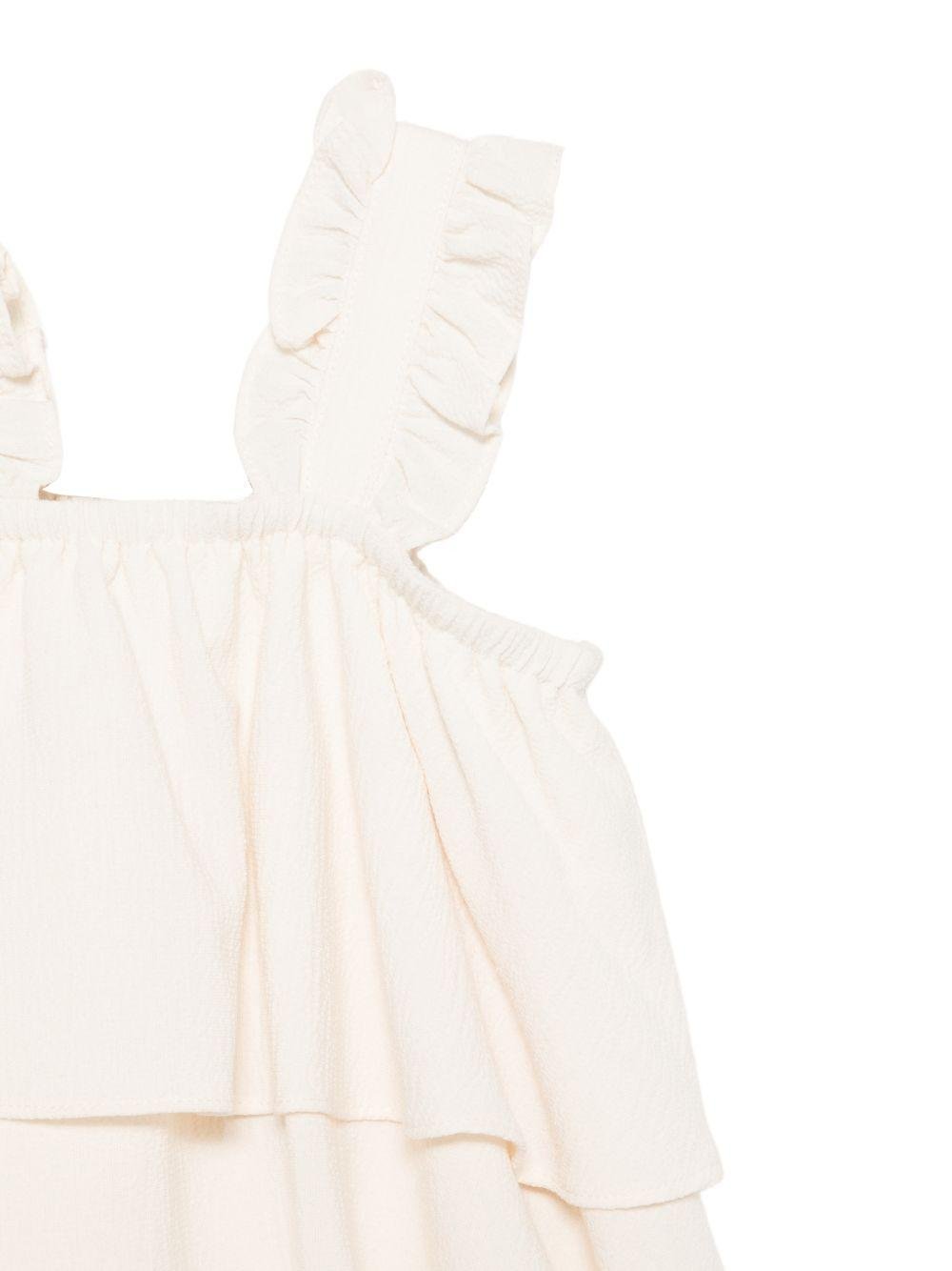 Tutina per neonata Donsje beige con design a strati - Rubino Kids