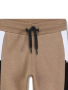 Pantaloni sportivi per bambino Boss Kids beige con inserti laterali a contrasto J52429 269 BOSS KIDS 