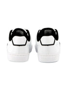Sneakers per bambino BOSS Kids bianche con dettaglio con placca con logo J52554 10P BOSS KIDS 
