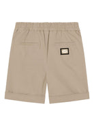 Shorts per bambino Dolce & Gabbana Kids beige con logo posteriore L43Q88 FUFL3 M0208 DOLCE & GABBANA KIDS 