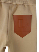 Pantaloni sportivi per bambino Lanvin Enfant beige con applicazione con logo N30299 276 LANVIN KIDS 