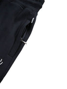 Pantaloni sportivi per bambino Molo Alvar nero con orli alle caviglie elasticizzati 6W25I202 0099 MOLO KIDS 