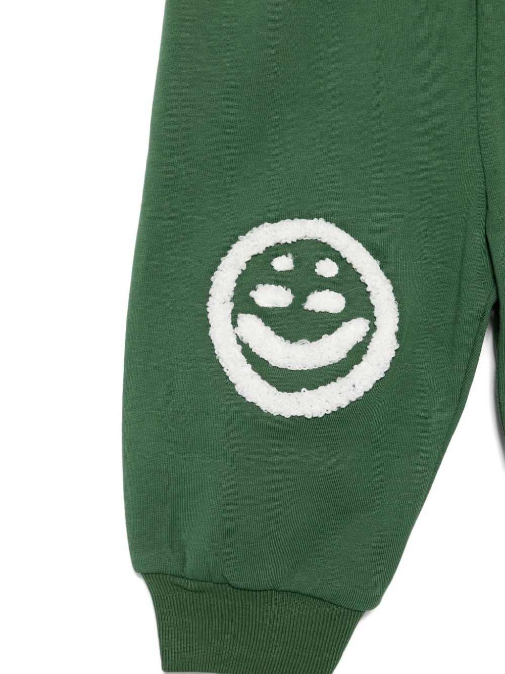 Pantaloni sportivi per neonato Molo verdi con faccina sorridente 6W25I210 5533 MOLO KIDS 