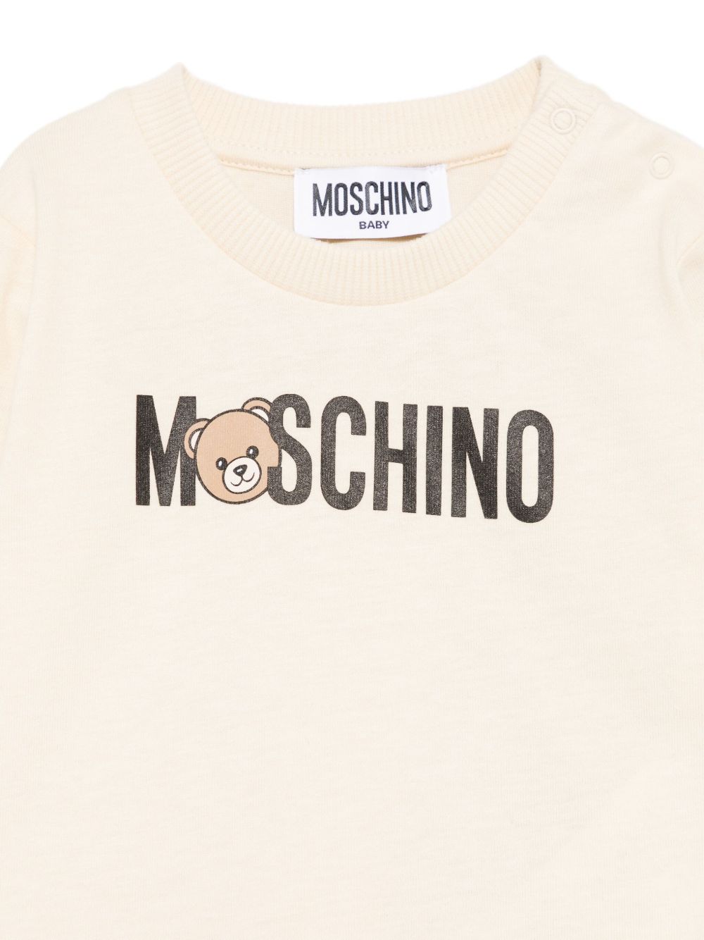 T-shirt per neonati Moschino Kids beige con stampa logo M8O00RLAA36 20404 MOSCHINO KIDS 