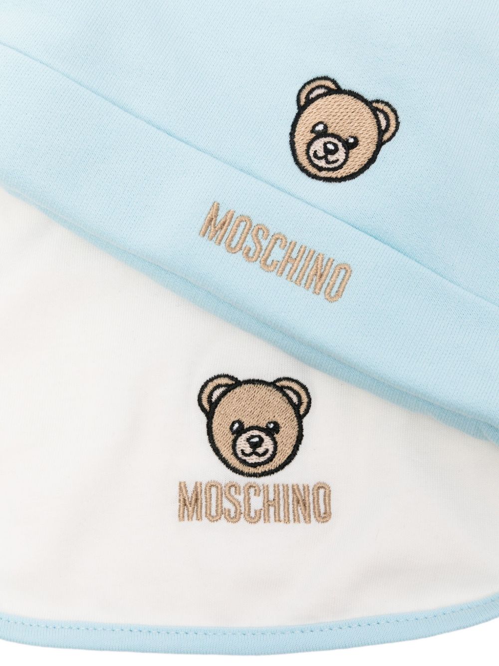 Set berretto e bavaglino per neonato Moschino Kids azzurro con motivo Teddy Bear MUY08OLCA60 40304 MOSCHINO KIDS 