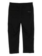 Pantaloni per bambini MSGM Kids neri con elastico in vita e orli svasati F5MSJUPA054 MS040 MSGM KIDS 