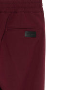 Pantaloni per bambini MSGM Kids bordeaux con elastico in vita e orli svasati F5MSJUPA054 MS045 MSGM KIDS 