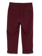 Pantaloni per bambini MSGM Kids bordeaux con elastico in vita e orli svasati F5MSJUPA054 MS045 MSGM KIDS 
