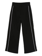 Pantaloni per bambina Off-White Kids neri con righe laterali bianche OBCJ007F25FLE001 1001 OFF WHITE KIDS 