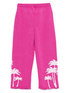 Pantaloni per bambina Palm Angels Kids fucsia con motivo albero di palma PGHG002F25KNI001 323C PALM ANGELS KIDS 