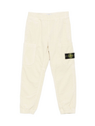 Pantaloni per bambino Stone Island Junior beige in velluto a coste con tasche applicate K2S163100005S0199 V0093 STONE ISLAND KIDS 