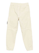 Pantaloni per bambino Stone Island Junior beige in velluto a coste con tasche applicate K2S163100005S0199 V0093 STONE ISLAND KIDS 