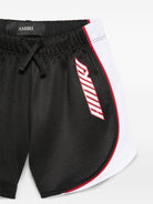 Shorts per bambino Amiri Kids nero con logo sul davanti ACBMSO1006 001 AMIRI KIDS 