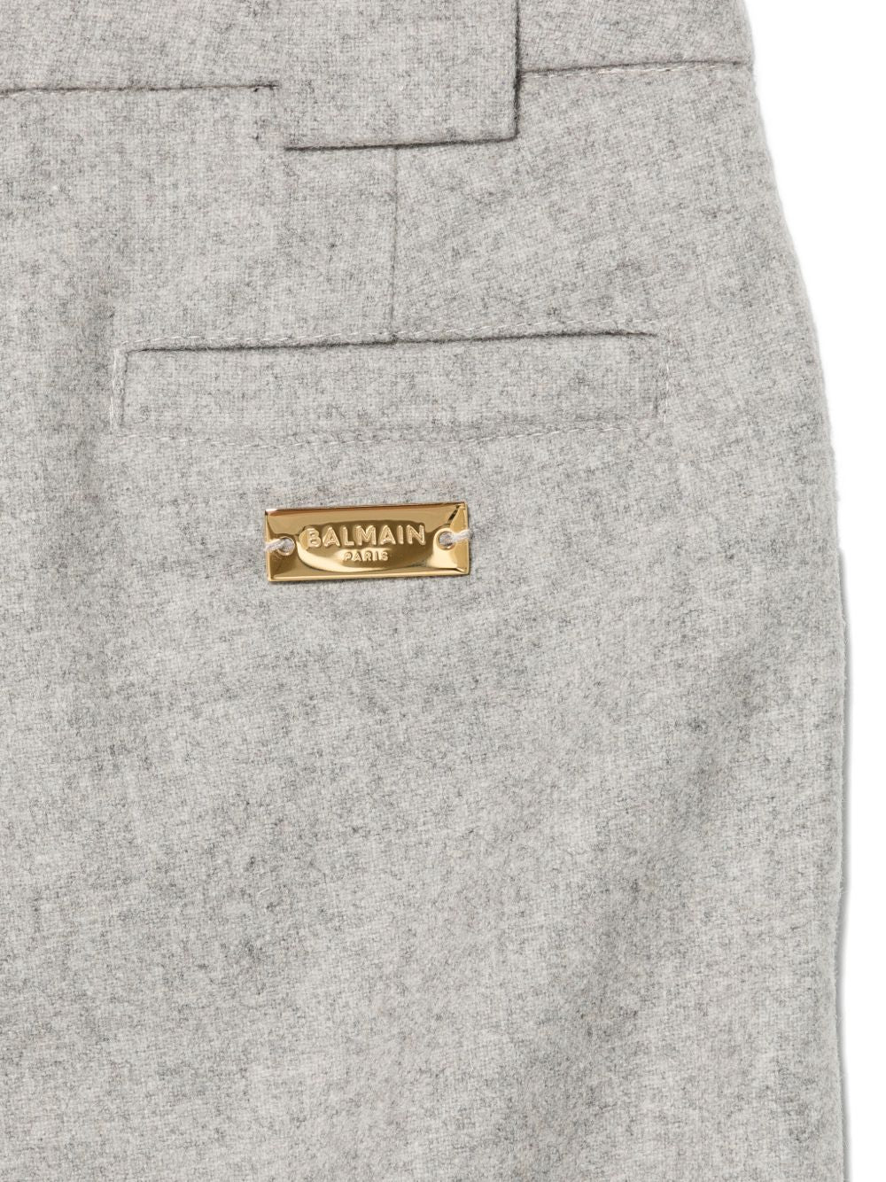 Pantaloni per bambino Balmain Kids grigi con placca con logo color oro BZ6A40 I0341 806OR BALMAIN KIDS 