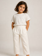 Pantaloni sportivi per bambina Balmain Kids bianchi con logo sul retro BZ6A80 Z3728 102NE BALMAIN KIDS 