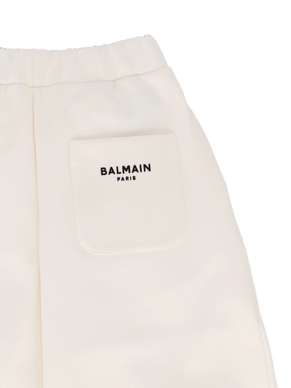Pantaloni sportivi per bambina Balmain Kids bianchi con logo sul retro BZ6A80 Z3728 102NE BALMAIN KIDS 