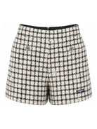 Shorts per bambina Balmain Kids bianco e neri con motivo a quadri BZ6B51 E0253 102AG BALMAIN KIDS 