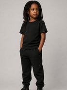 Pantaloni per bambino Balmain Kids neri con logo ricamato sul davanti BZ6I00 Z3183 930 BALMAIN KIDS 