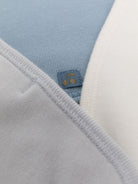 Set di tre bavaglini per neonato Bonpoint Kids multicolore con targhetta logo PEBIOBAV3B 110 BONPOINT KIDS 