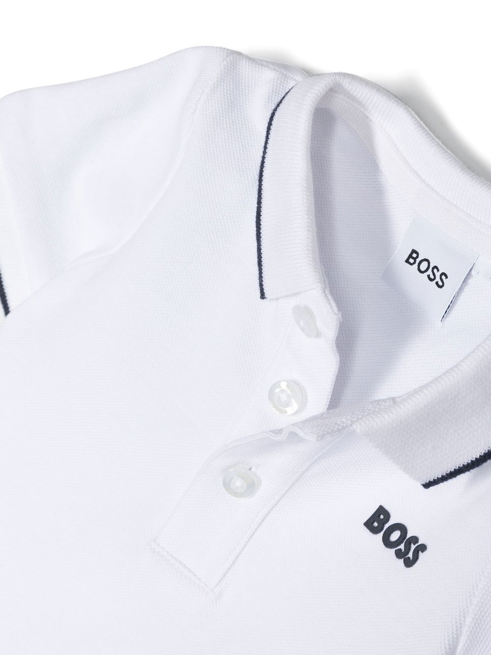 Polo con stampa per neonato BOSS Kidswear bianco con logo sul petto J05P13 10P BOSS KIDS 