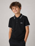 Polo per bambino Boss Kids nera con logo goffrato J25P26 09B BOSS KIDS 