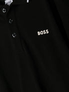 Polo per bambino Boss Kids nera con logo goffrato J25P26 09B BOSS KIDS 