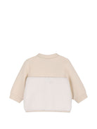 Tuta sportiva per neonato Boss Kids beige con inserti in pelliccia sintetica J53320 21K BOSS KIDS 
